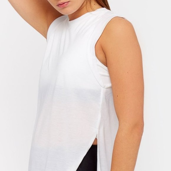 Under Armour sleeveless athletic top w/ high side slits Size- L Color- White - Picture 1 of 9